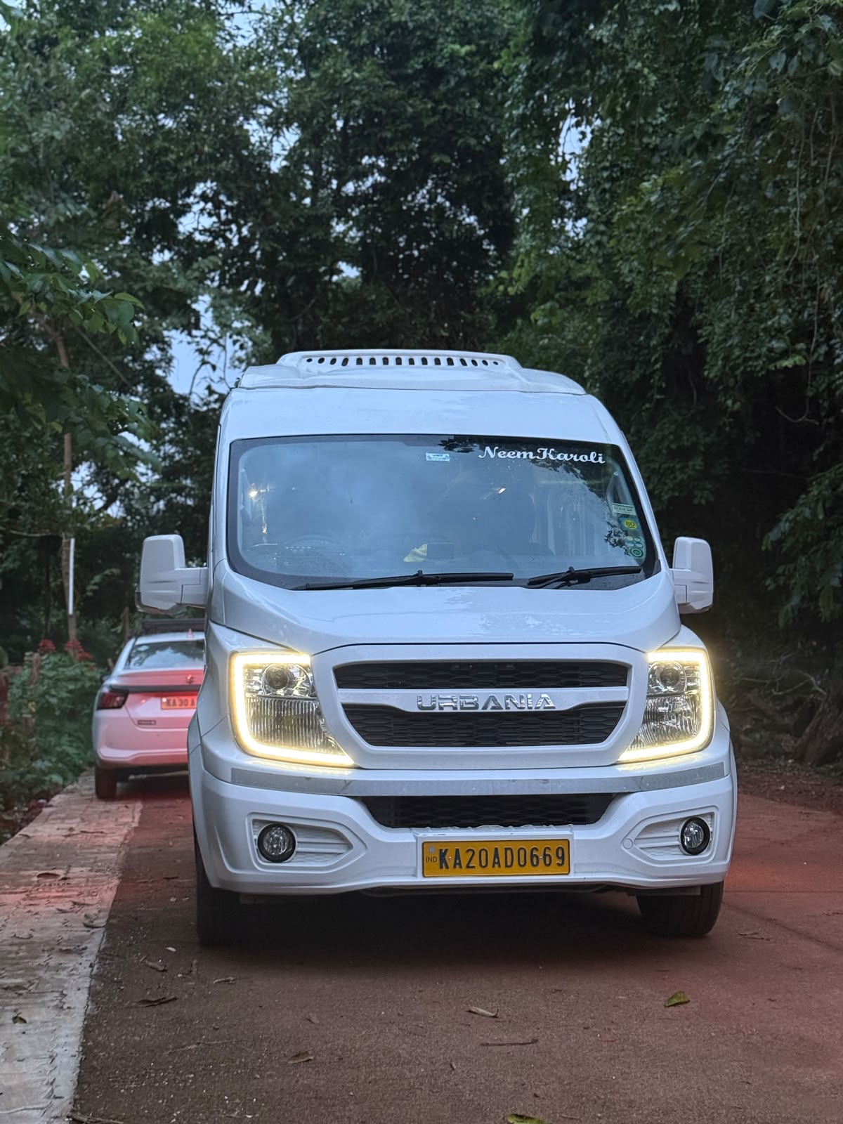 Shree Lakshmi Travels luxury fleet on the coastal road of Udupi
