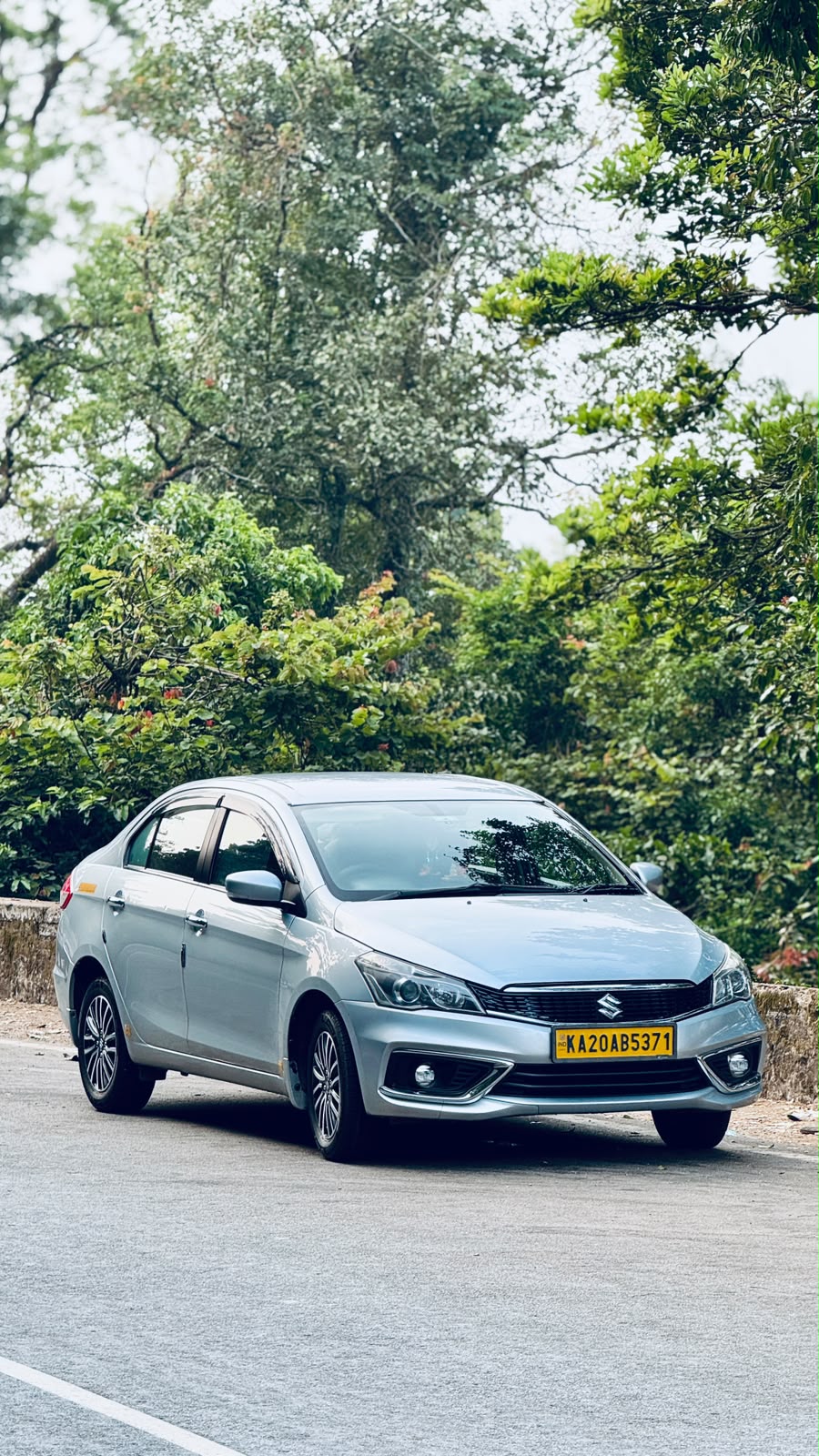 Ciaz sedan taxi on a coastal Karnataka road